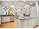 Spacious kitchen featuring stainless steel appliances, granite countertops, and a view into the living room at 2714 Twin Leaf Trl, Marietta, GA 30062