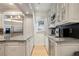 Bright kitchen with stainless steel appliances, granite countertops, and custom white cabinetry at 2714 Twin Leaf Trl, Marietta, GA 30062