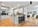 Kitchen boasts granite countertops, white cabinetry and easy access to a casual dining area at 2714 Twin Leaf Trl, Marietta, GA 30062