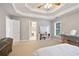 The main bedroom with a view into the bathroom and a large closet and white decor at 2714 Twin Leaf Trl, Marietta, GA 30062