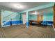 Basement rec room with an old pool table, a drop ceiling, and wall to wall carpet at 3500 Stillwood Dr, Snellville, GA 30039