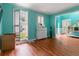 Cozy living room with bright walls and natural light streaming through shuttered windows at 3500 Stillwood Dr, Snellville, GA 30039