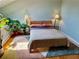 Cozy bedroom featuring hardwood floors, lots of plants, and natural light at 1078 Piedmont Ne Ave # 206, Atlanta, GA 30309
