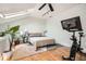 Bright bedroom with skylight, hardwood floors, and modern exercise equipment for a healthy lifestyle at 1078 Piedmont Ne Ave # 206, Atlanta, GA 30309