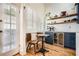 Eat-in kitchen featuring custom cabinets, stainless appliances and open access to the outdoors at 1078 Piedmont Ne Ave # 206, Atlanta, GA 30309