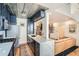 Gourmet kitchen with stainless steel appliances, custom cabinets and waterfall countertops at 1078 Piedmont Ne Ave # 206, Atlanta, GA 30309