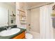 Functional bathroom featuring a tub/shower combination and essential amenities at 1382 Koble Mill Ln, Riverdale, GA 30296
