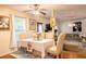 Bright dining area with elegant furnishings and decor, perfect for Gathering meals and entertaining guests at 1382 Koble Mill Ln, Riverdale, GA 30296