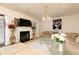 Cozy living room featuring a fireplace, comfortable seating, and stylish decor at 1382 Koble Mill Ln, Riverdale, GA 30296