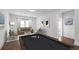 Well-lit game room featuring a pool table, comfortable seating, and neutral decor at 1572 Wicker Wood Se Pl, Smyrna, GA 30080