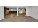 Spacious living room features neutral walls and new flooring, showcasing the potential for customization at 5267 Sheppard Ln, Stone Mountain, GA 30083