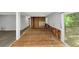 Spacious living room features neutral walls, new flooring, and a sliding glass door to the outside deck at 5267 Sheppard Ln, Stone Mountain, GA 30083