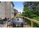 Spacious back deck featuring stylish outdoor furniture, providing an ideal space for relaxation and entertaining at 912 Sunny Meadows Ln, Marietta, GA 30062