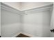 A well-lit walk-in closet showing ample storage space with white shelving at 912 Sunny Meadows Ln, Marietta, GA 30062