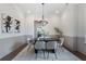 Elegant dining room with modern table, stylish chairs, and sophisticated decor at 912 Sunny Meadows Ln, Marietta, GA 30062