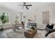 Bright home office features natural light, modern decor, and comfortable seating area at 912 Sunny Meadows Ln, Marietta, GA 30062