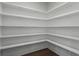 Walk-in pantry features ample shelving, providing plenty of storage space at 912 Sunny Meadows Ln, Marietta, GA 30062