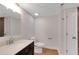 Bathroom with modern vanity, updated fixtures, and stylish mirror and lighting at 112 Valley Rd, Stockbridge, GA 30281