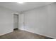 Carpeted bedroom with a closet, neutral paint, and ample natural light at 112 Valley Rd, Stockbridge, GA 30281