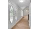 Inviting entryway with hardwood flooring and decorative double doors with leaded glass at 112 Valley Rd, Stockbridge, GA 30281