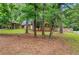 Exterior of the home shows a carport and well-maintained landscaping at 112 Valley Rd, Stockbridge, GA 30281