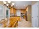 Open kitchen featuring granite countertops, stainless steel appliances, and an adjacent dining area at 1245 Grace Hadaway Ln, Lawrenceville, GA 30043