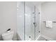 Bright bathroom with tiled shower with glass surround, modern fixtures, and toilet at 1247 Zucchini Se Cir, Atlanta, GA 30315