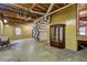 Unfinished basement with wood paneled walls, concrete floor, and exposed pipes at 3452 Monica Lane Southwest Sw Ln, Conyers, GA 30094