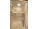 Clean white shower featuring a shower head and a built-in seat at 3452 Monica Lane Southwest Sw Ln, Conyers, GA 30094