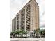 Exterior view of a high-rise apartment building with multiple balconies at 620 Peachtree Ne St # 1111, Atlanta, GA 30308