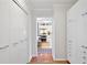 Hallway with ample closet space leading into the kitchen at 620 Peachtree Ne St # 1111, Atlanta, GA 30308