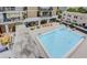 Aerial view of a large community pool and outdoor seating area at 620 Peachtree Ne St # 1111, Atlanta, GA 30308