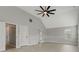 Spacious bedroom featuring vaulted ceilings, a ceiling fan, light gray walls, and wood-look flooring at 766 Chapman St, Jonesboro, GA 30238