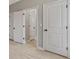 Hallway with multiple doors, offering privacy and access to various rooms at 766 Chapman St, Jonesboro, GA 30238