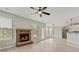 Inviting living room with a fireplace, access to the backyard, and open flow to the kitchen at 766 Chapman St, Jonesboro, GA 30238