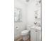 Bright bathroom with modern fixtures, white cabinetry, and a clean, minimalist design for functional use at 954 Bouldercrest Se Dr, Atlanta, GA 30316