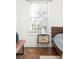 Close up of a bedroom with hardwood floors and natural light at 954 Bouldercrest Se Dr, Atlanta, GA 30316