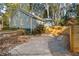 Exterior view of home with fenced yard and driveway at 954 Bouldercrest Se Dr, Atlanta, GA 30316