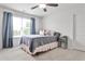 Comfortable bedroom with a cozy bed, soft lighting, and a bedside table at 148 Sierra Cir, Woodstock, GA 30188