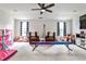 Bright bonus room with two leather armchairs and a gymnastics balance beam at 148 Sierra Cir, Woodstock, GA 30188