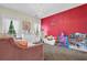 Playful bedroom featuring a pink daybed, decorative wall art, and plenty of space for toys and activities at 250 Lawrence Pl, Atlanta, GA 30349