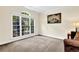 Comfortable living room with large windows providing natural light and relaxing view at 250 Lawrence Pl, Atlanta, GA 30349