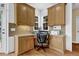 Cozy built-in office nook with ample cabinet space and natural light at 250 Lawrence Pl, Atlanta, GA 30349