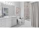 Clean bathroom with a tub/shower combo, marble countertop, and modern fixtures at 325 Edwards Brook Ln, Canton, GA 30115