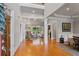 Grand foyer with hardwood floors, high ceilings, and views into the elegant living room at 325 Edwards Brook Ln, Canton, GA 30115