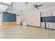 Spacious garage with custom cabinets, storage solutions and epoxy flooring at 325 Edwards Brook Ln, Canton, GA 30115