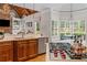 Open concept kitchen with granite countertops, island gas range, and breakfast nook at 325 Edwards Brook Ln, Canton, GA 30115