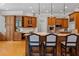 Spacious kitchen with custom wood cabinets, marble countertops, and stainless-steel appliances at 325 Edwards Brook Ln, Canton, GA 30115