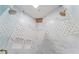 Contemporary shower design featuring dual shower heads and stylish tile accents at 325 Edwards Brook Ln, Canton, GA 30115