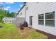 Cozy backyard patio with outdoor seating and a grill, ideal for enjoying outdoor meals at 359 Crider Ct, Woodstock, GA 30188